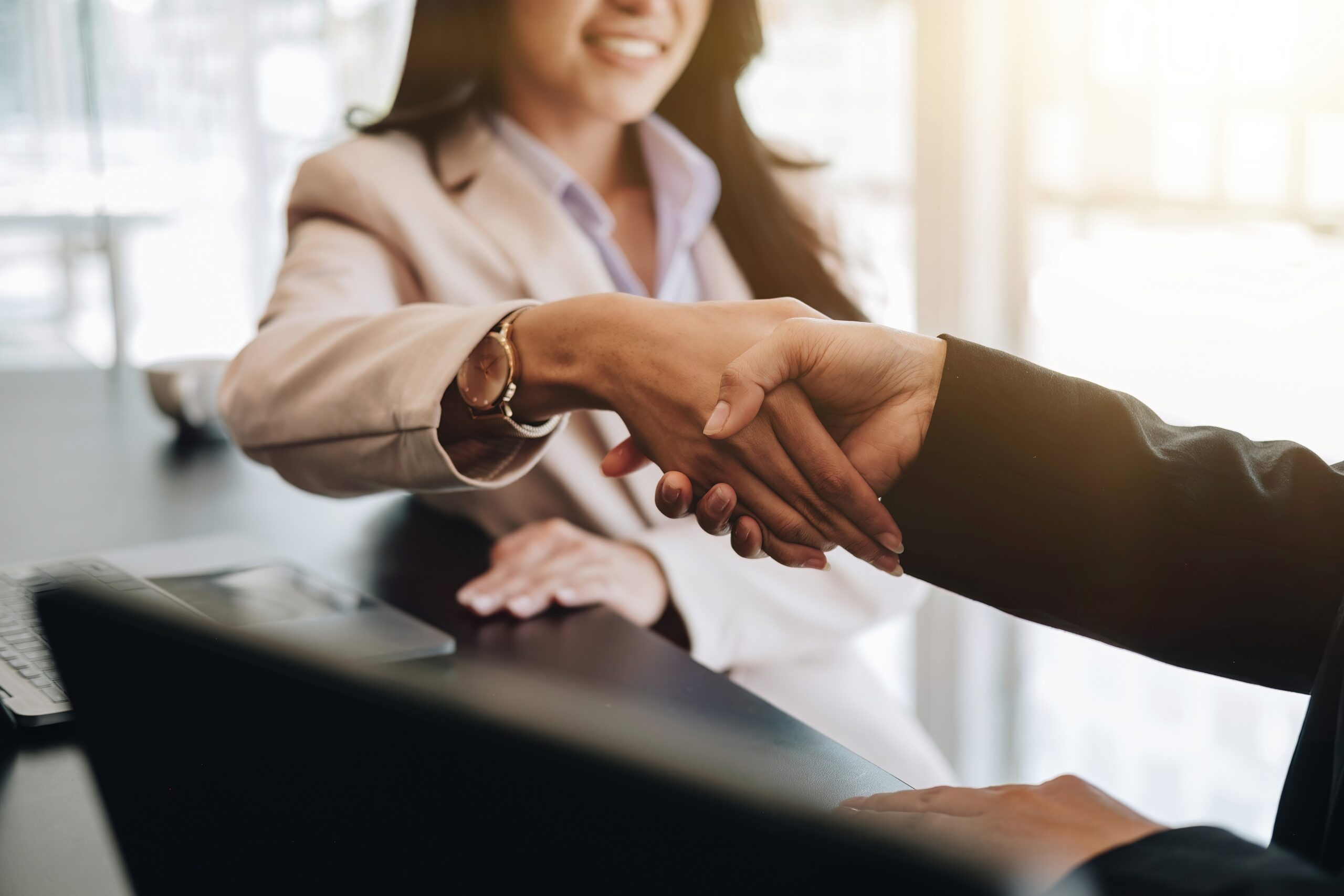 client acquisition strategy ending with a handshake and a yes